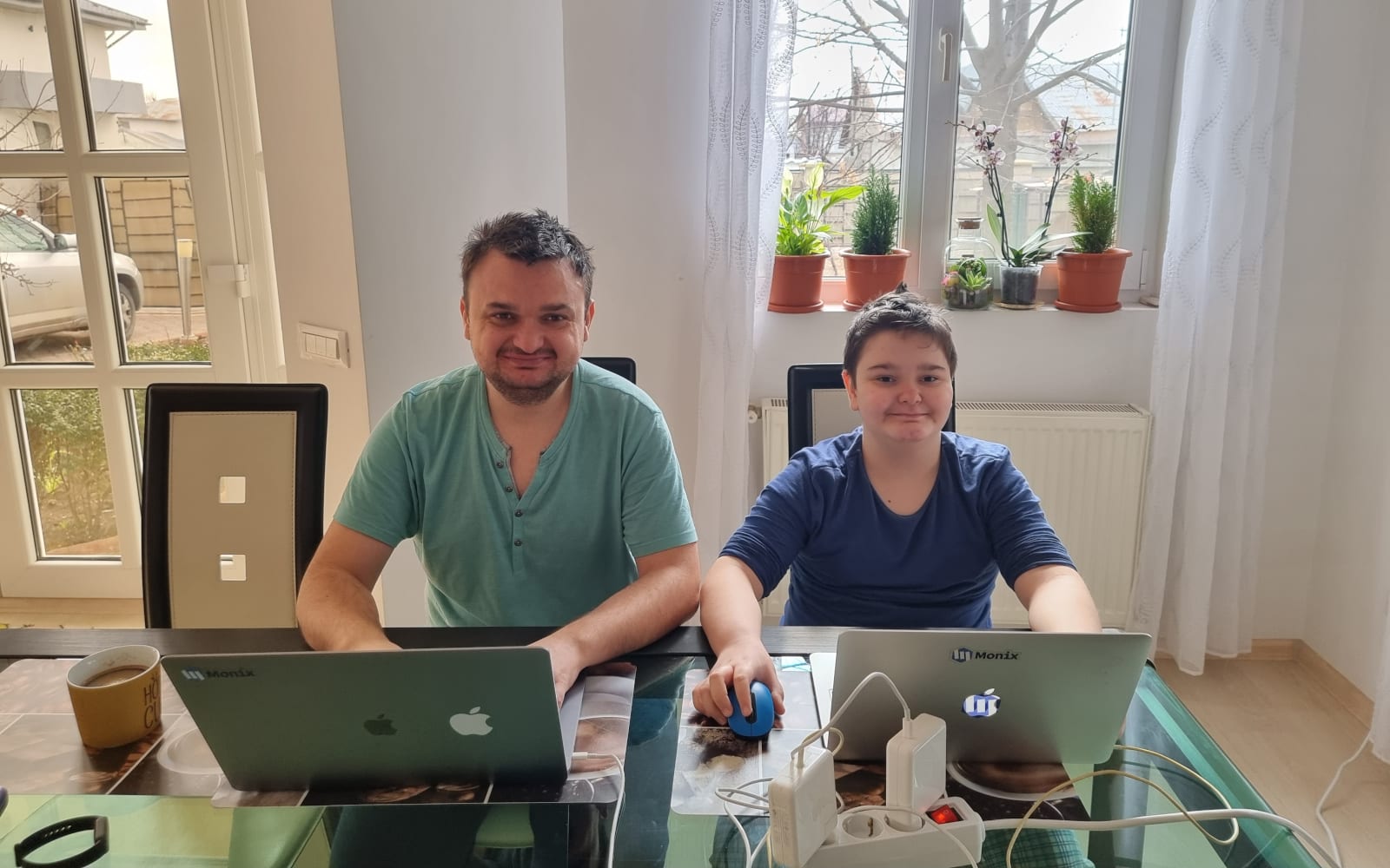 Me, with my son, learning the Lua programming language on proprietary macOS laptops.